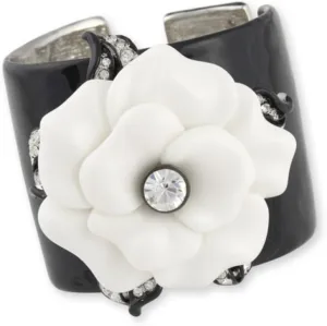 KENNETH JAY LANE, BLACK ENAMEL CUFF WITH WHITE FLOWER ACCENT