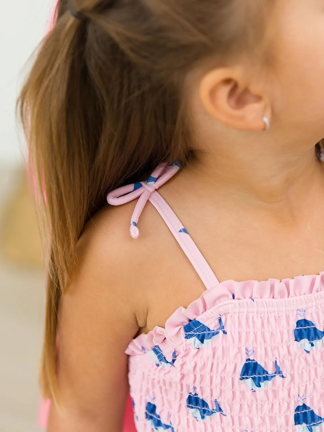 RuffleButts Girls UPF50  Sun Protection Peplum Smocked Bodice/Tulle Skirted One Piece Swimsuit